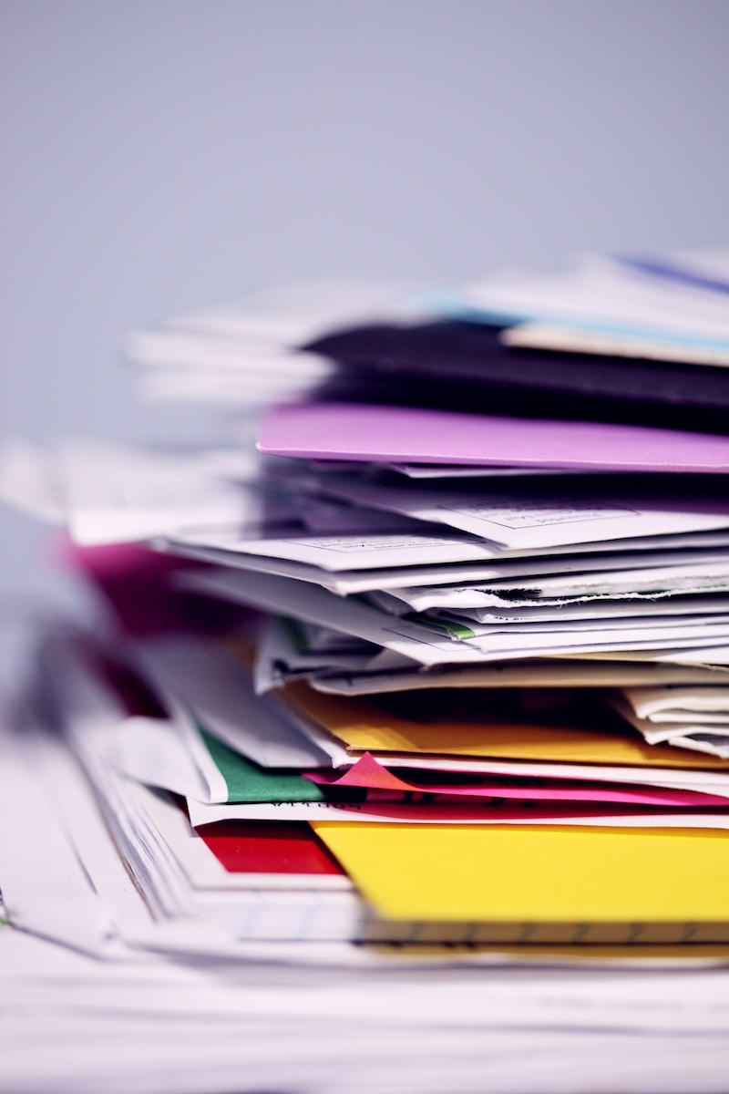 Photo by Alexander Grey pile of printing papers